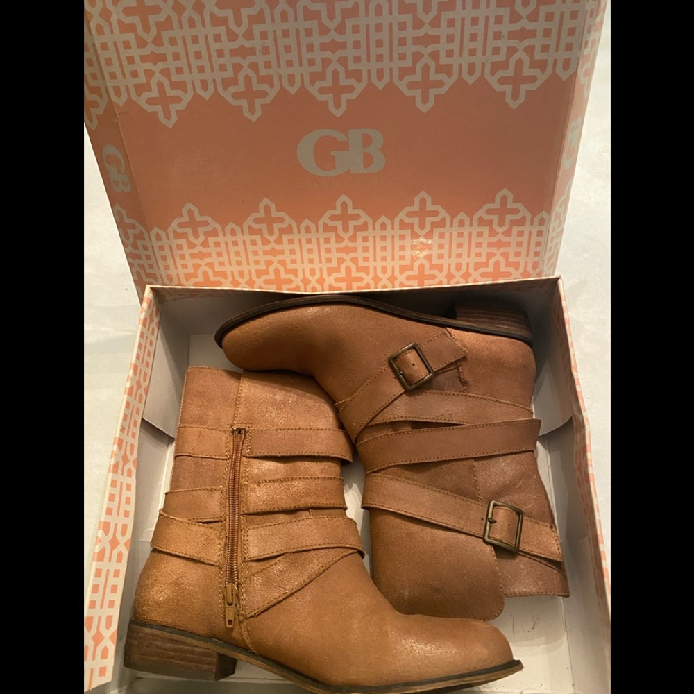 Mid calf one inch heeled women’s boots